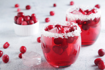 Glasses with red cranberry cocktail	
