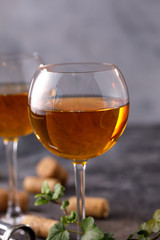 Two glasses with white wine on a textural background. Copy space. Place for your text.