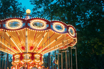 Carousel Merry-Go-Round. Summer Evening In City Amusement Park.