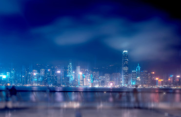 Fototapeta na wymiar Abstract bokeh light with Hong Kong City night view background; Double Exposure