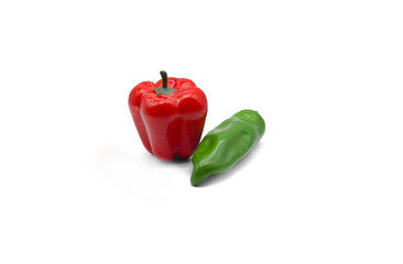 Red and green peppers on a white background