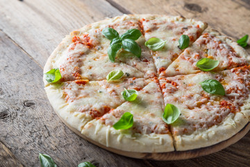 Pizza Margherita. Cheese pizza with fresh basil