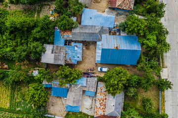 Top aerial view above village in the country Europe