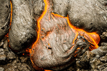 Close up of hot lava flow. Lava near active Volcano Tolbachik, Kamchatka, Russia