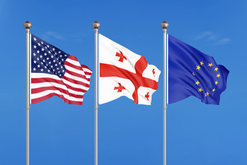 Three colored silky flags in the wind: USA (United States of America), EU (European Union) and Georgia. 3D illustration.