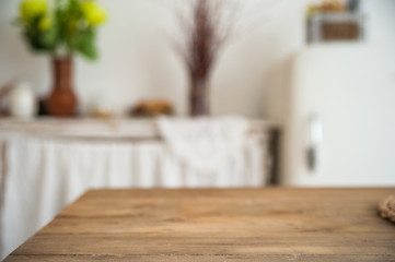 Background from a wooden texture table in the kitchen in a rustic style. The interior of bright Scandinavian cuisine.