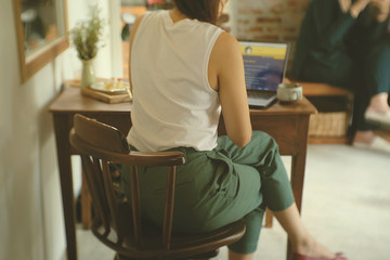 woman sitting on chair