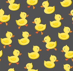 Ducklings, seamless pattern, color, gray, vector. Yellow ducklings on a gray field. Seamless pattern. Color, flat vector picture. Funny ducklings.  