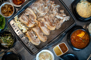 Korean style pork barbeque Samgyeopsal with side dish