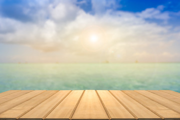 wooden table and blue sky background