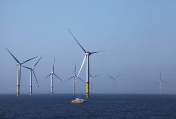 Wind farm offshore. Sustainable green energy.