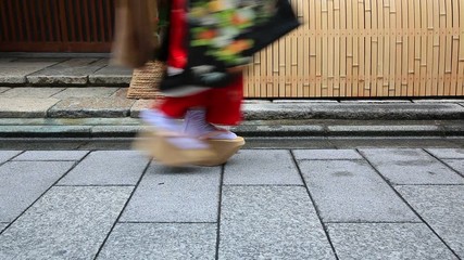 Close up of feet of maiko walking in slow motion