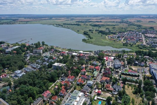 Drone Aerial Perspective View on Touristic City center Located at Jamno Lake with Yacht Marina