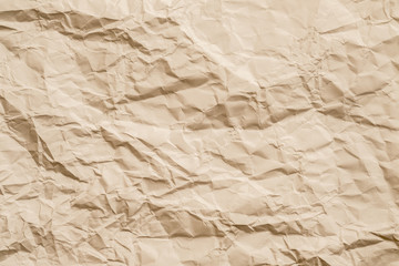 Blank beige crumpled paper. Aged effect. Biodegradable material. Abstract art background. Copy space.