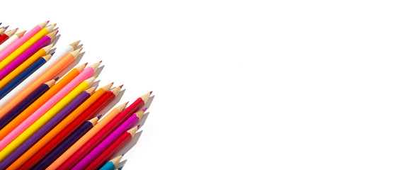 Back to school banner of multicolored pencils isolated on white background