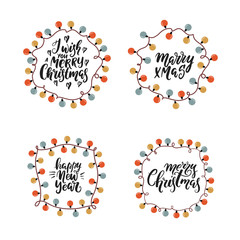 Christmas lights with holiday lettering on white