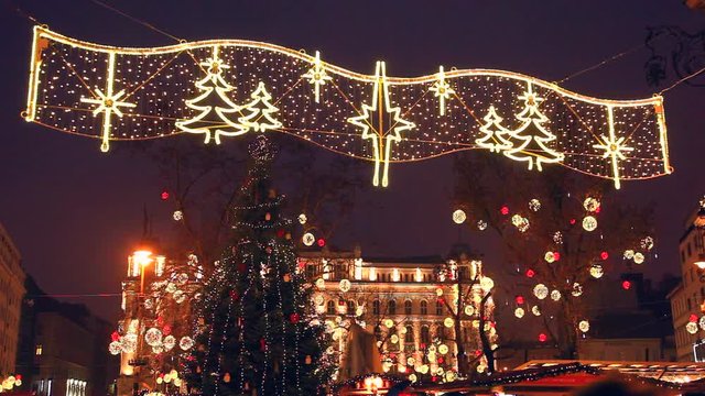 Christmas tree and decoration in town square, night, Budapest, Hungary