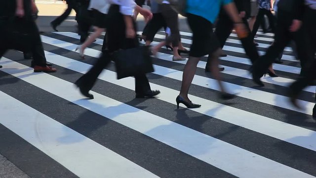 Crowd of pedestrians on crosswalk, Tokyo, Japan