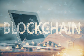 Blockchain theme hud with businessman working on computer on background. Concept of crypto chain....
