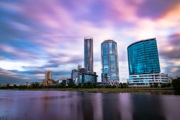 Beautiful cityscape Yekaterinburg at sunset with blurred blue and purple clouds