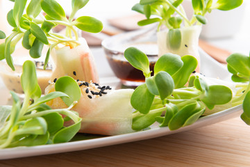 Rice paper salad rolls with carrot,sunflower sprout, corn and crab stick