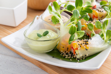 Rice paper salad rolls with carrot,sunflower sprout, corn and crab stick