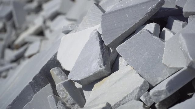 Pieces of marble stones with field of depth video extracted from a marble quarry in Marmara island, Balikesir, Turkey