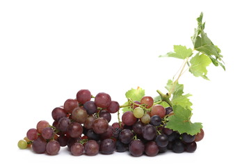 Fresh Cardinal grapes with leaf isolated on white background