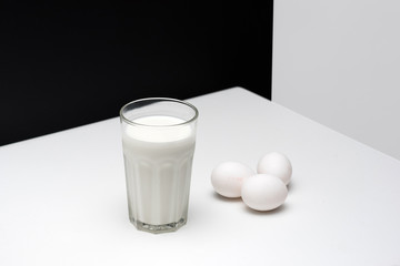 A glass of milk with eggs