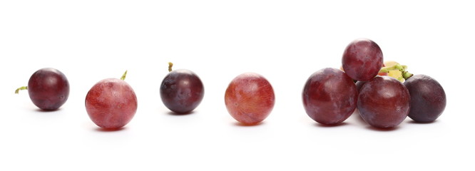 Fresh Cardinal grapes isolated on white background