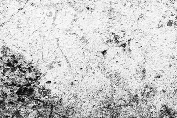 Texture of a concrete wall with cracks and scratches which can be used as a background