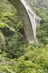 Solkan stone railway bridge in Slovenia over the river Soсa