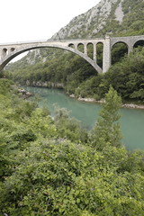 Fototapeta premium Solkan stone railway bridge in Slovenia over the river Soсa