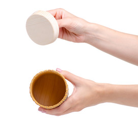 Wooden kitchen food container in hand on white background isolation