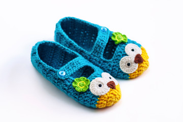  Women's hobby. Crochet and knitting. Working space. Cozy colorful Slippers in the form of owls for the home.
