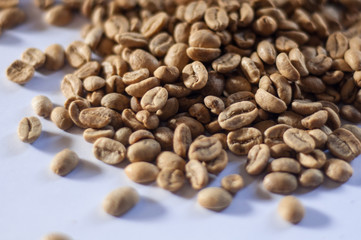 Unroasted Coffee Beans On White Background