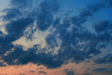 The sky in the clouds. Getting dark. Sunset