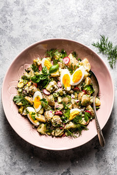 A Healthy Potato Salad In A Pink Bowl