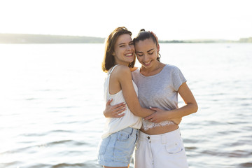 Front view smiley friends hugging