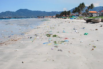 rubbish and dirt on a sandy beach in Vietnam, Nha Chang province