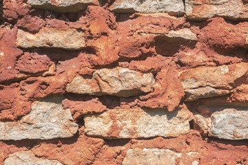 Careless laying of limestone stones. Orange solution