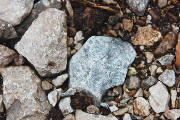 stone nature wet dirt earth asphalt road texture pebble monolith granite flint rock boulder cobblestone abstraction background