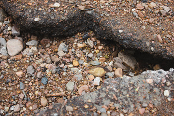 stone nature wet dirt earth asphalt road texture pebble monolith granite flint rock boulder cobblestone abstraction background