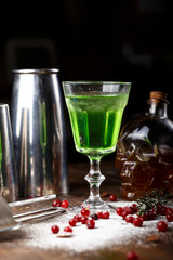 green cocktail with absinthe