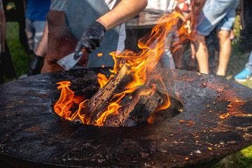 Fire BBQ. Flame grill closeup, outdoor barbecue.