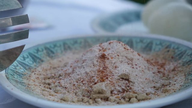 Prepering spices for traditional Asian cousine