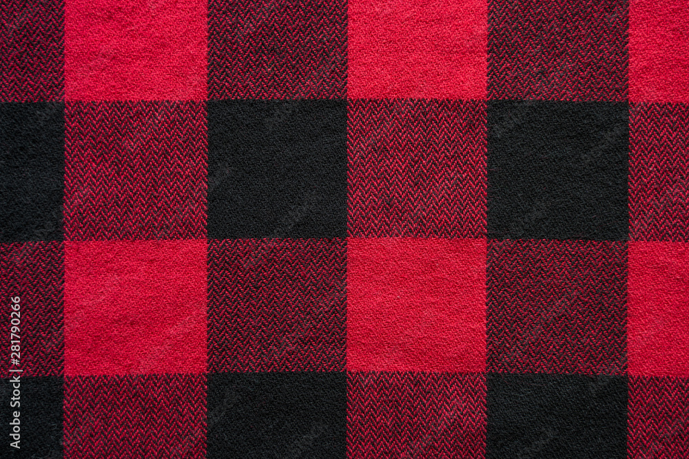 Wall mural Black and Red Fabric in a Cage. Plaid material. Clothes background