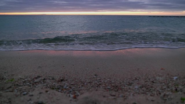 Sunset over sea and beach