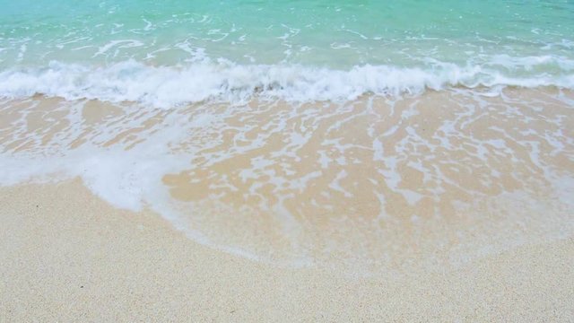 Sandy beach and waves in sea, Japan