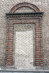 RUSSIA - OCTOBER 30, 2013 A large brick window in a Soviet building of gray-brown color